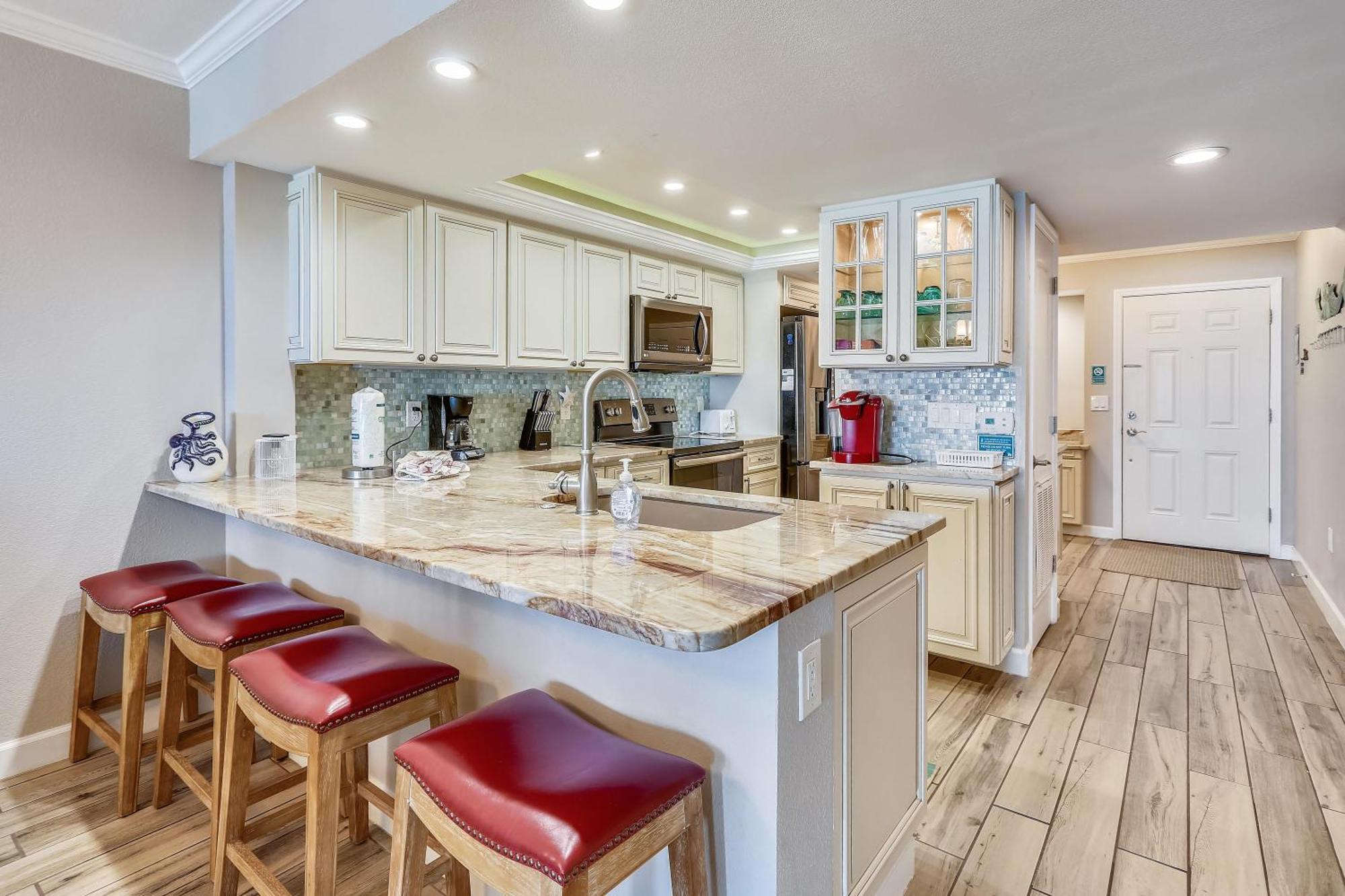 Land's End 11-405 Front - Premier St. Pete Beach
